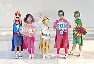 Superheroes Cheerful Kids Expressing Positivity Concept