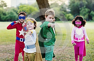 Superheroes Cheerful Kids Expressing Positivity Concept photo