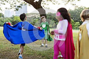 Superheroes Cheerful Kids Expressing Positivity Concept