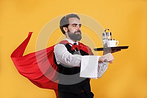 Superhuman butler with cape and platter