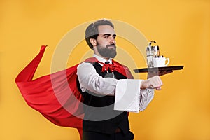 Superhuman butler with cape and platter photo