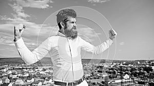 Superiority and power. Hipster bearded looks attractive. Man bearded feels proud himself sky background. Self proud and