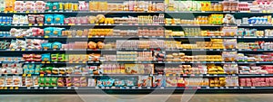 Supermarket shelves with packaged food products neatly organized photo
