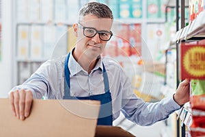 Supermarket clerk at work