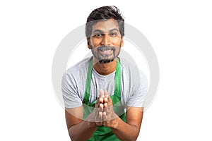 Supermarket employee making requesting gesture