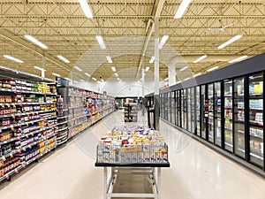 Supermarket - Grocery store with food section aisle - Editorial image