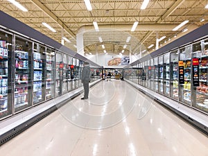 Supermarket - Grocery store with food section aisle - Editorial image