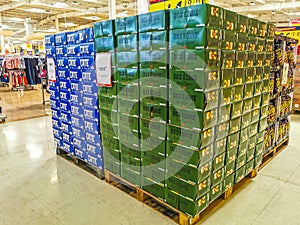 Supermarket from the inside Shelves Goods People Shopping carts Products