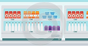 Supermarket shelves with dairy products.