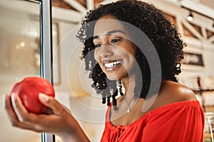 Supermarket, shopping and black woman with quality apple check, healthy food price and discount for commerce, retail and