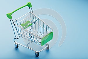 Supermarket shopping cart isolated on blue background