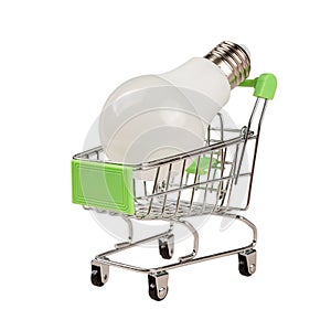 supermarket shopping cart with modern led light bulb isolated close-up