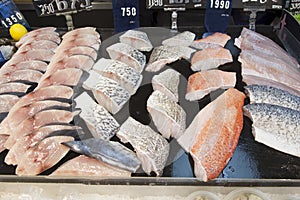 Supermarket stall with raw fish