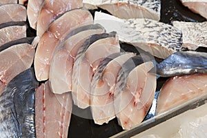 Supermarket stall with raw fish