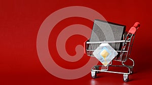 Supermarket trolley with black box and RFID tag transponder.  The concept of recognizing goods and preventing shoplifting with an