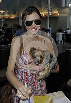 Supermodel Miranda Kerr is seen with dog at LAX