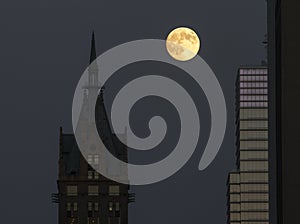 Supermoon between skyscrapers