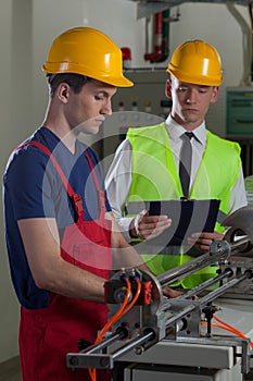 Supervision in a factory photo