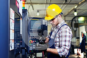 Supervisor doing quality control and production check in factory