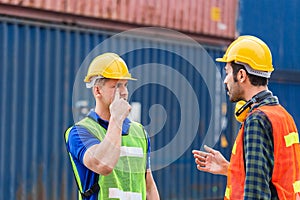 Supervisor and foreman worker team in the container yard, Industrial engineer and inspector or safety supervisor working in