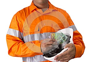 Supervisor or work man with high visibility shirt holding and c