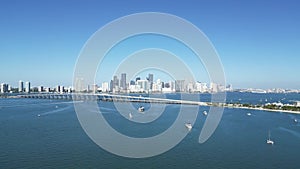 Superyacht in Biscayne Bay with downtown Miami skyline