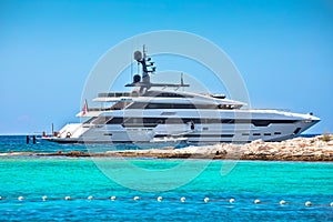 Superyacht near turquoise beach on Paklenski islands view, Hvar archipelago