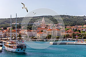 Supetar city in Brac island, Croatia. View from the sea. Picturesque scenic view on Supetar on Brac island, Croatia. Panoramic