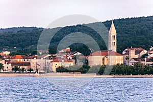 Supetar city in Brac island, Croatia. View from the sea. Picturesque scenic view on Supetar on Brac island, Croatia. Panoramic