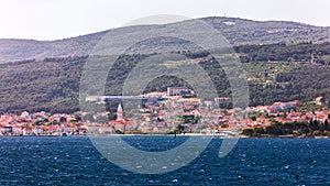 Supetar city in Brac island, Croatia. View from the sea. Picturesque scenic view on Supetar on Brac island, Croatia. Panoramic