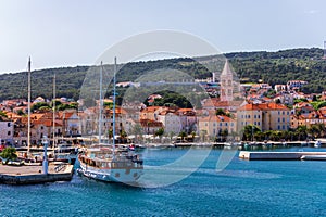 Supetar city in Brac island, Croatia. View from the sea. Picturesque scenic view on Supetar on Brac island, Croatia. Panoramic