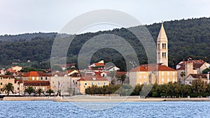 Supetar city in Brac island, Croatia. View from the sea. Picturesque scenic view on Supetar on Brac island, Croatia. Panoramic