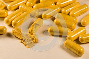 Supplement Drug Capsules With Powder On White Surface Close-up
