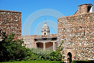 Supplier courtyard and gardens at the Nasrid Palace in Malaga castle.