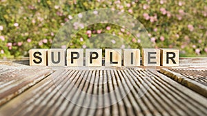 Supplier word made with building blocks, concept