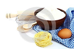 Supplies and ingredients for baking or making pasta.