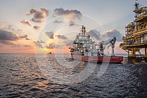 Supply boat when sunset