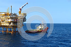 Supply boat transfer cargo to oil and gas industry and moving cargo from the boat to the platform