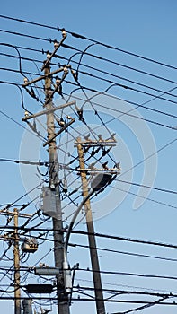 Supply of electric pole in Japan with blue sky background