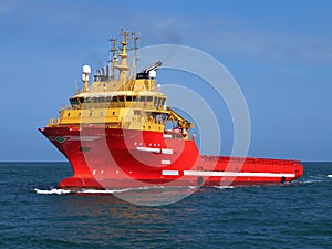 Supply Vessel Underway at Sea. photo