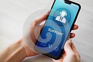 Support, Customer service icon on mobile phone screen. Call center, 24x7 assistance.