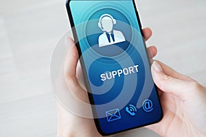 Support, Customer service icon on mobile phone screen. Call center, 24x7 assistance. photo