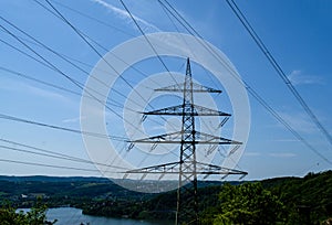 Support high-voltage power line in Germany on the background of nature