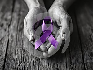 Support and Hope: Grayscale Hand with a Purple Awareness Ribbon for Cancer Awareness photo