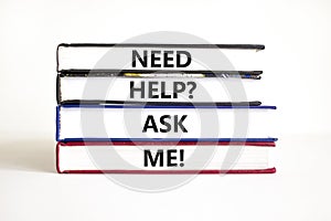 Support and need help ask me symbol. Concept words Need help ask me on books on a beautiful white table white background. Business