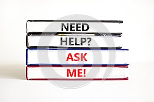 Support and need help ask me symbol. Concept words Need help ask me on books on a beautiful white table white background. Business