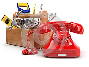 Support or service concept. Toolbox with telephone on white