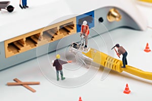 It support services. workers repairing internet connection