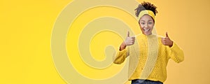 Supportive friendly modern trendy african-american female friend supporting you show thumbs-up keep up good work gesture