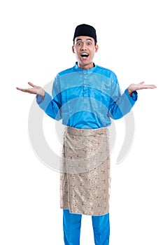 suprised man with melayu traditional clothes